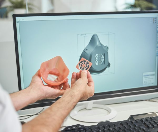 Anonymous engineer with 3D face mask